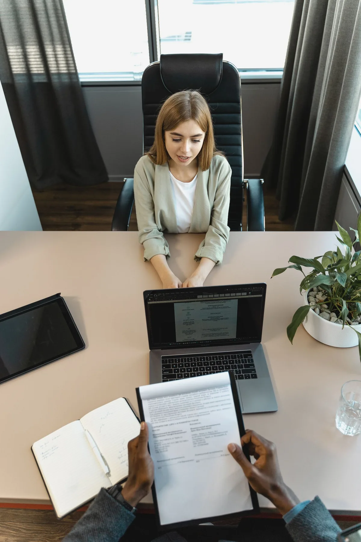 Digital Marketing Agency | ZenWeb Malaysia A candidate sitting across the desk from an interviewer in an office