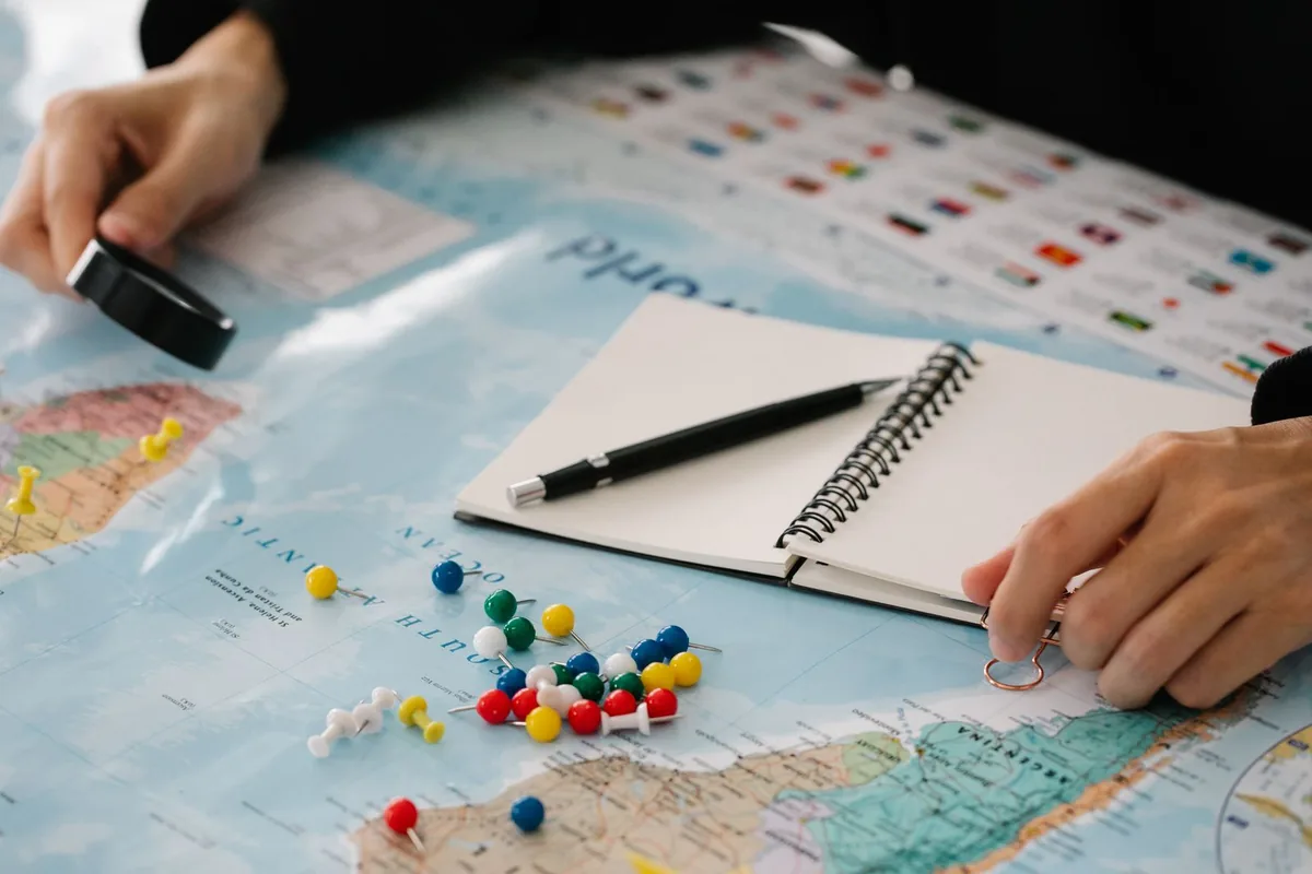 Digital Marketing Agency | ZenWeb Malaysia Close-up of a map marked with multicoloured pins