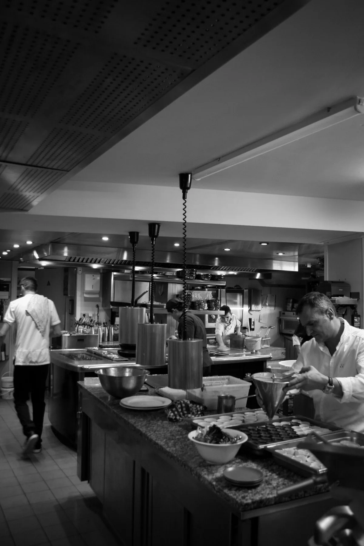Digital Marketing Agency | ZenWeb Malaysia A commercial restaurant kitchen working through service tickets